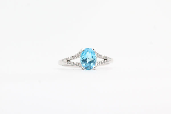 White Gold Blue Topaz Split Shank Ring