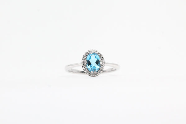 White Gold Blue Topaz Halo Ring