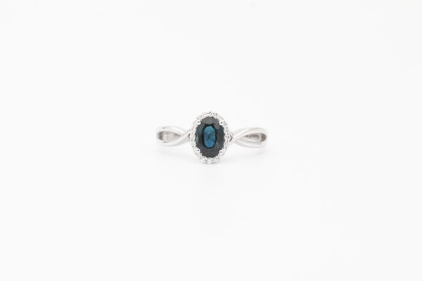 White Gold Oval Sapphire and Diamond Halo Ring with Twisted Band