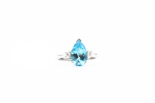 White Gold Pear Shaped Blue Topaz and Diamond Ring