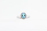 White Gold Blue Topaz Halo Ring