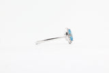 White Gold Blue Topaz Halo Ring