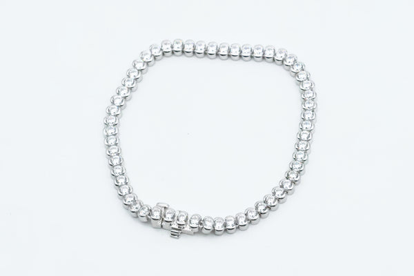 Sterling Silver Half Bezel Lassaire Tennis Bracelet