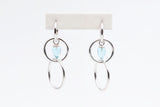 Sterling Silver Hoops with Blue Topaz