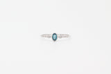 White Gold Oval Cut Bezel London Blue Topaz and Diamond Ring