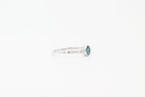 White Gold Oval Cut Bezel London Blue Topaz and Diamond Ring