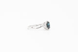 White Gold Oval Sapphire and Diamond Halo Ring with Twisted Band
