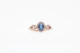 Rose Gold Oval Sapphire and Diamond Halo Engagement Ring